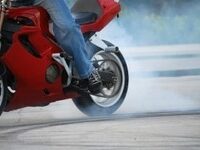 1301095_motorcycle_stunter_tyre_burnout_-sxchu-thumb-225x150-425741